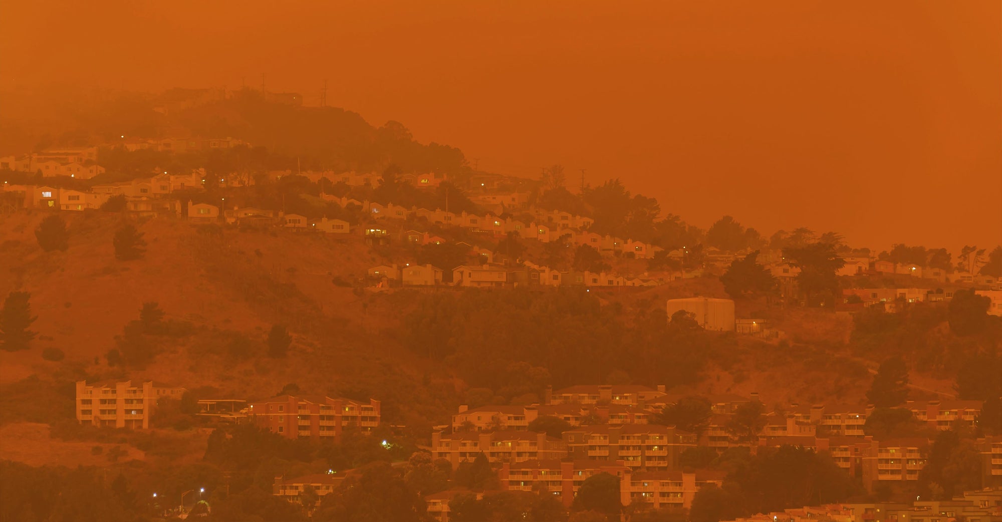 Poor air quality obscures visibility around houses